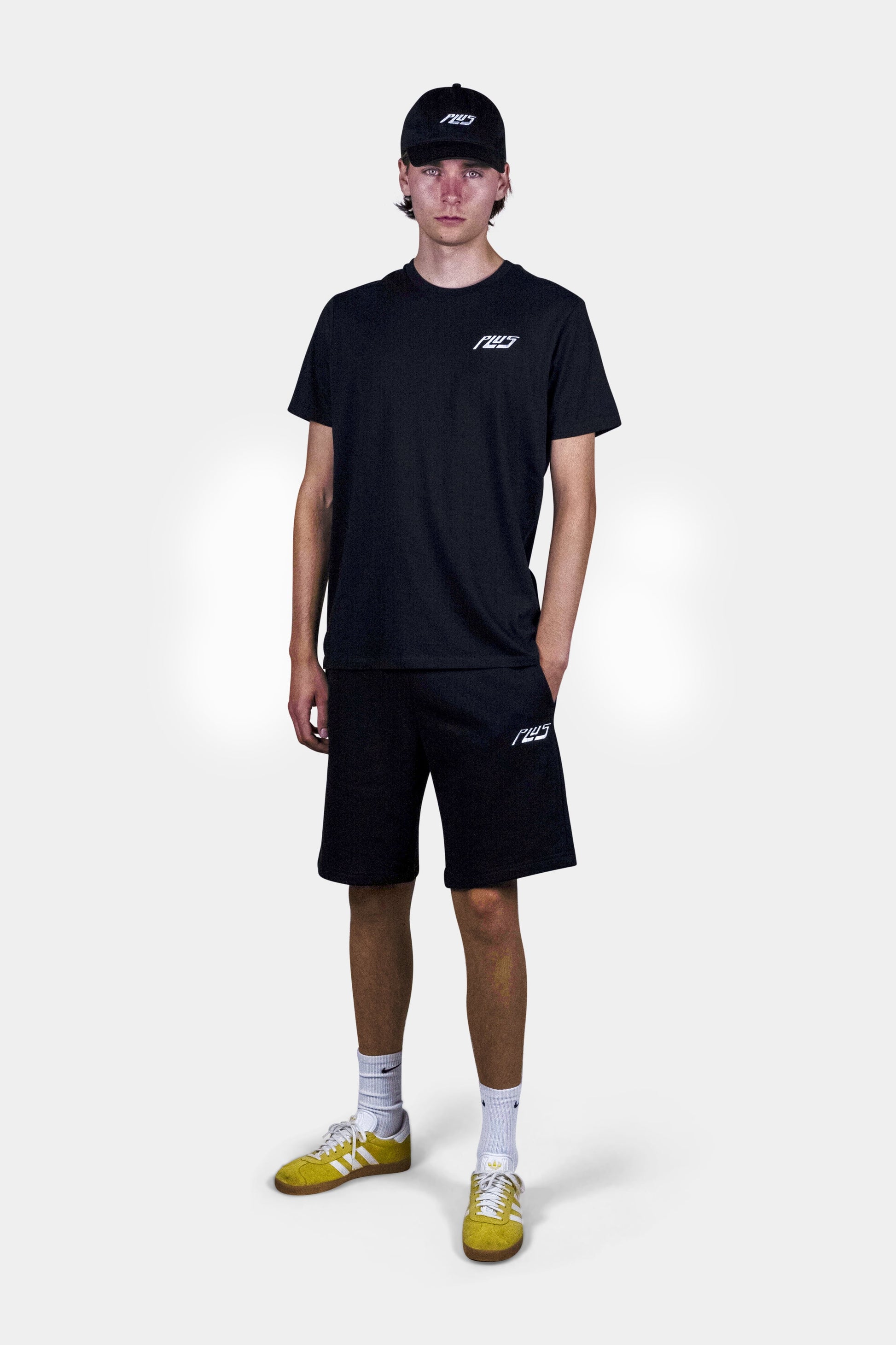 Stylish cotton blend shorts in black with deep side pockets and a relaxed fit, perfect for summer days, beach outings, and everyday comfort