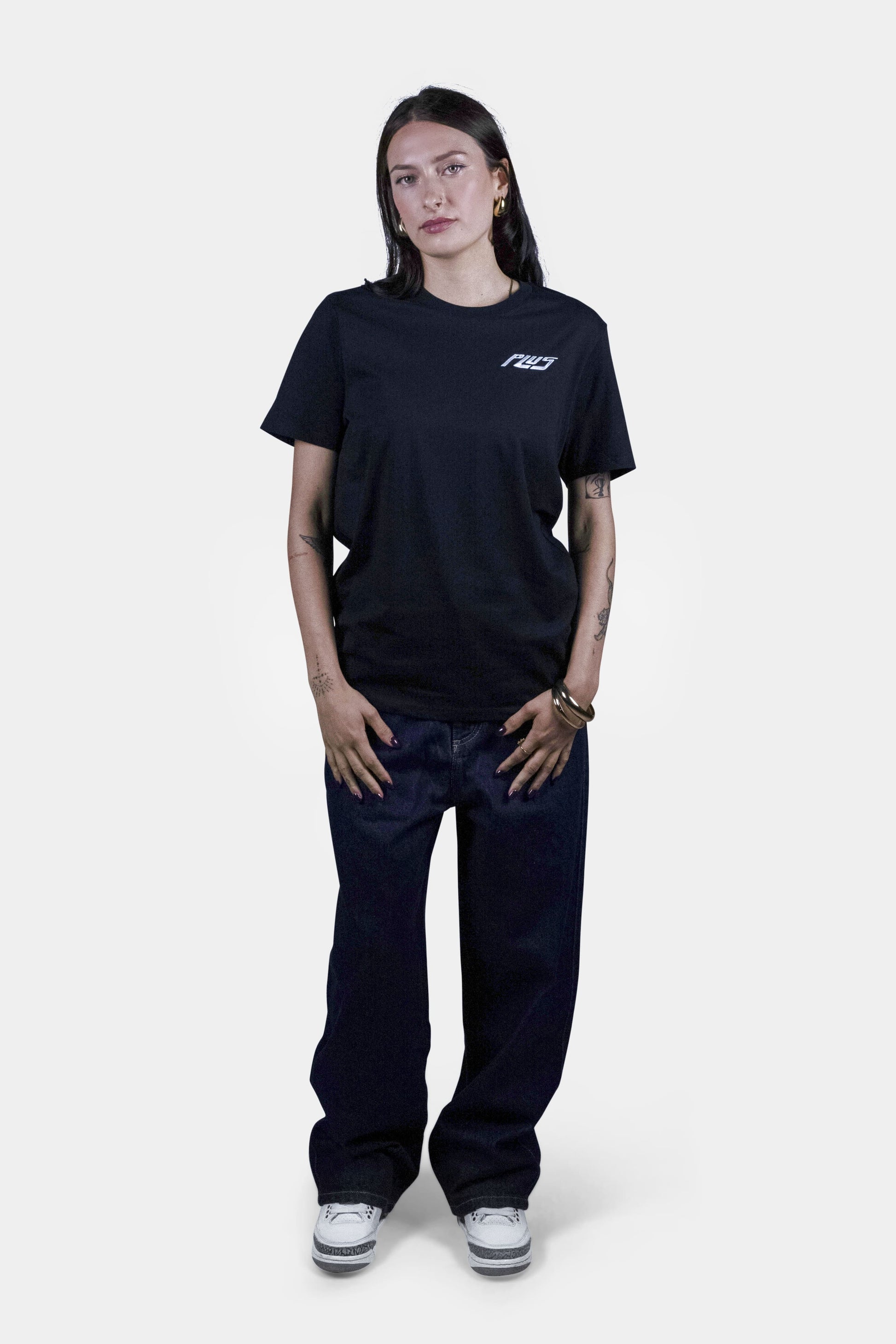 Unisex cotton t-shirt in black with a comfortable fit, featuring PLUS logo perfect for casual wear