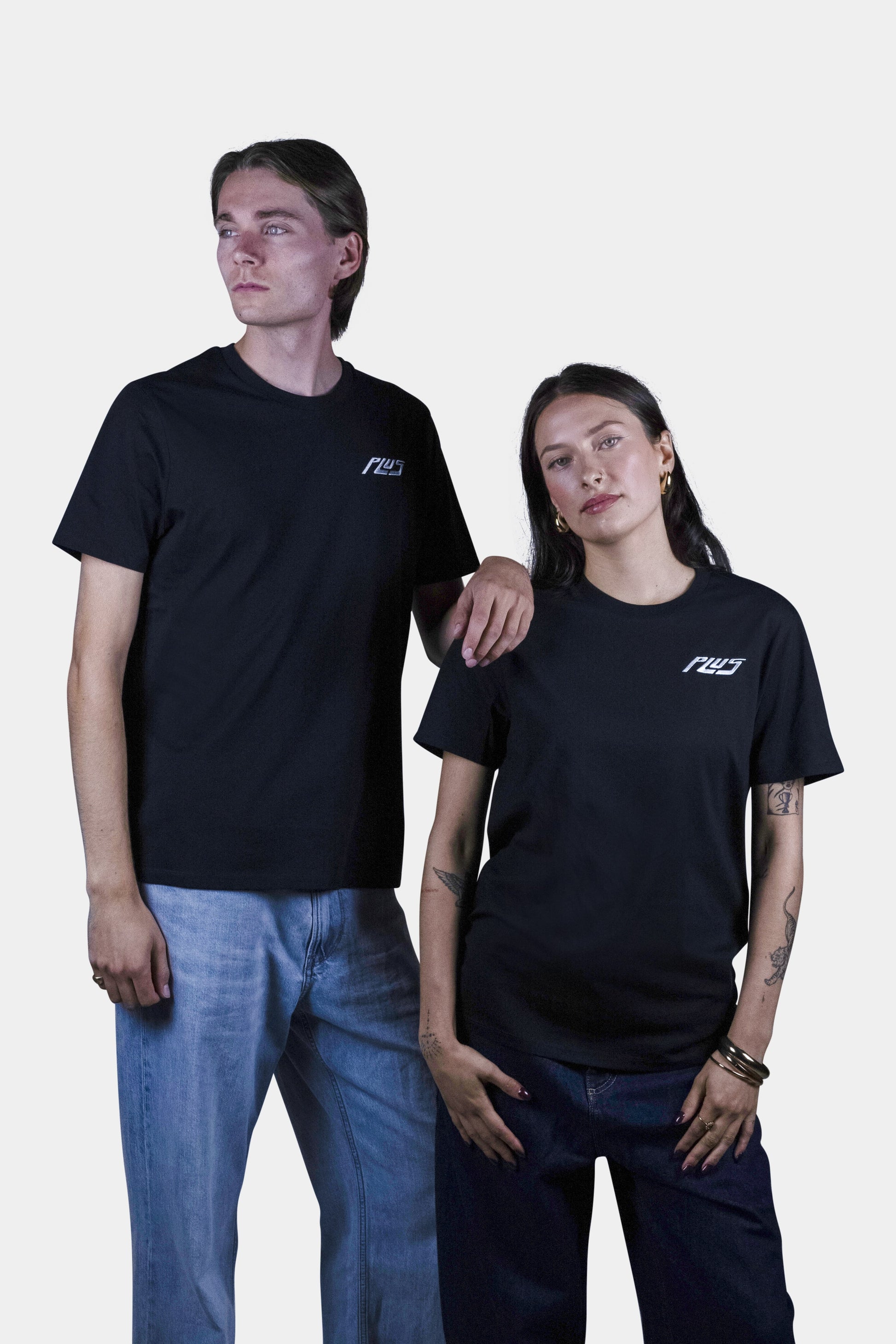 Unisex cotton t-shirt in black with a comfortable fit, featuring PLUS logo perfect for casual wear