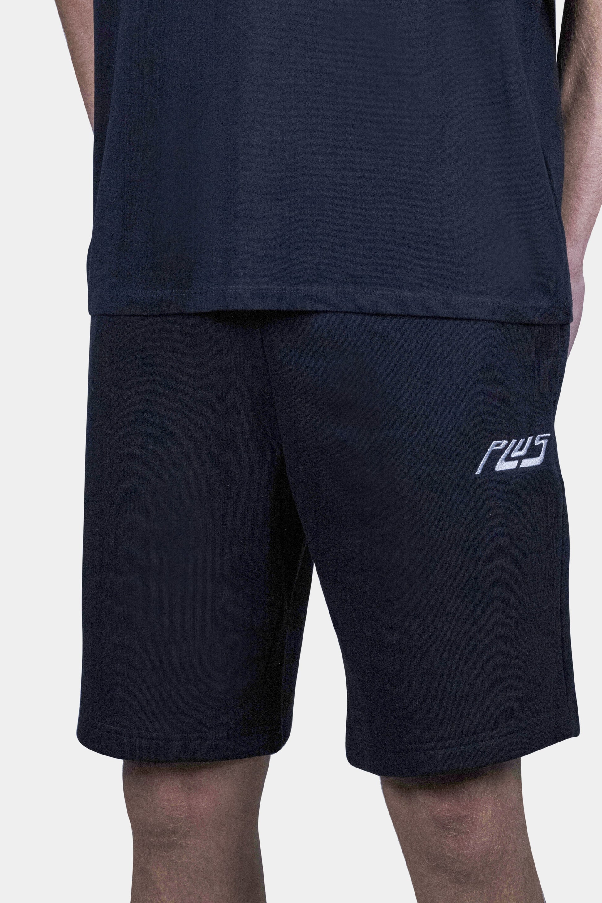 Stylish cotton blend shorts in navy blue with deep side pockets and a relaxed fit, perfect for summer days, beach outings, and everyday comfort