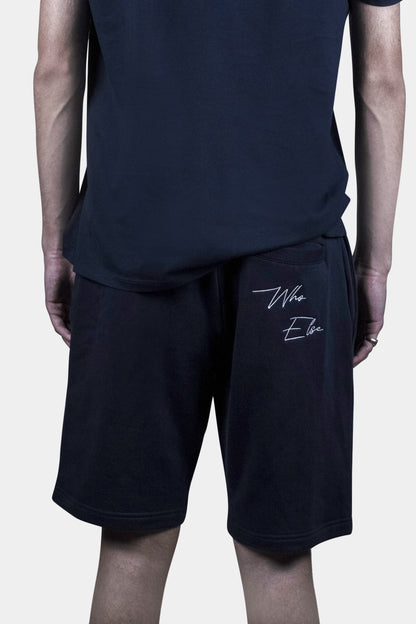 Stylish cotton blend shorts in navy blue with deep side pockets and a relaxed fit, perfect for summer days, beach outings, and everyday comfort
