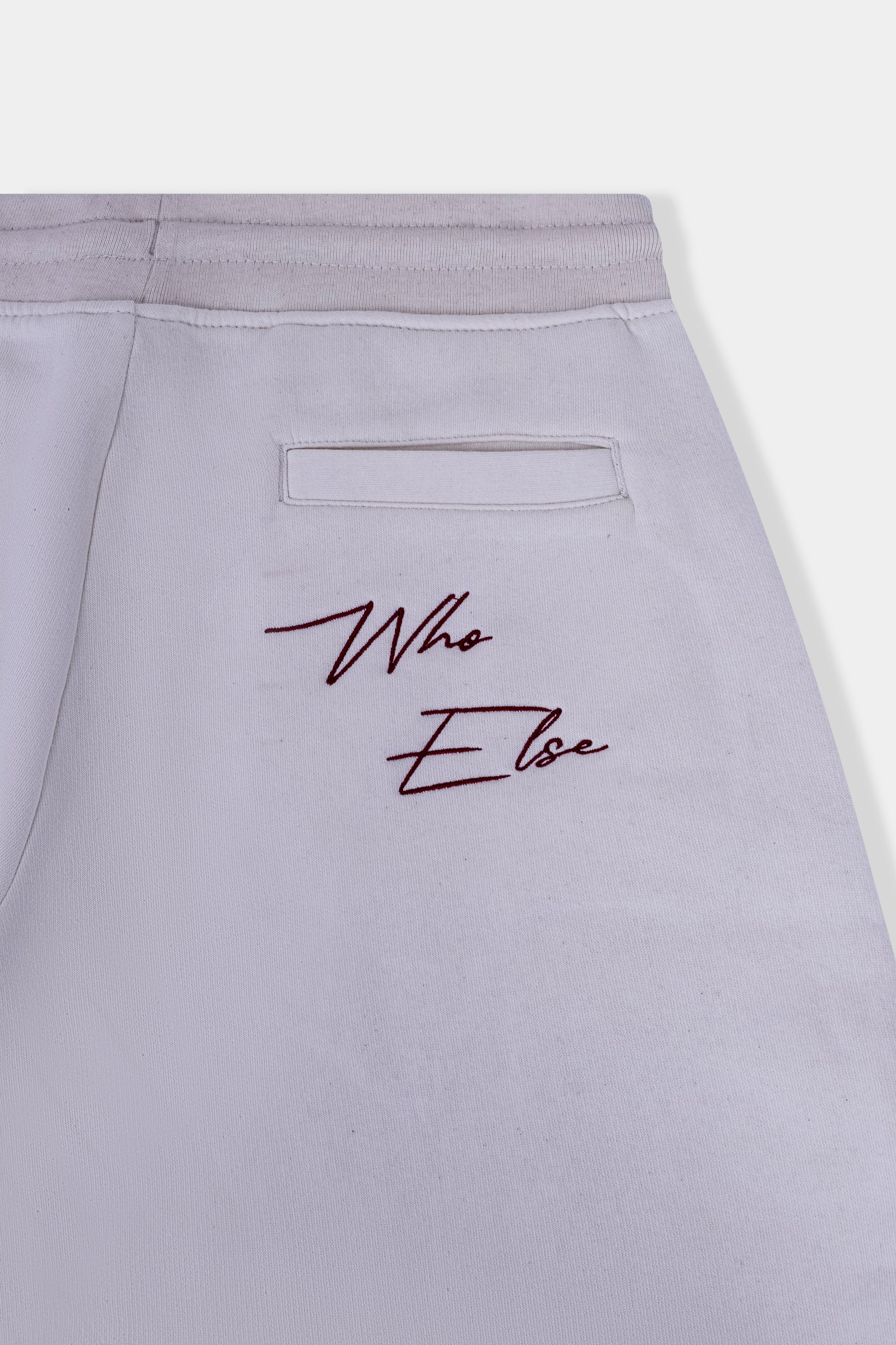 Stylish cotton blend shorts in white with deep side pockets and a relaxed fit, perfect for summer days, beach outings, and everyday comfort